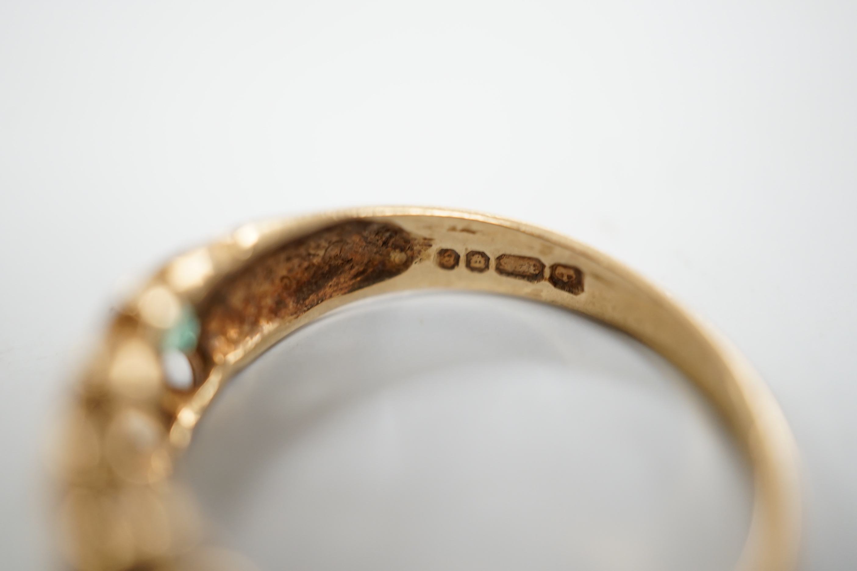 An Edwardian 18ct gold and diamond chip set ring, size M, gross weight 2.6 grams and two later 9ct gold and gem set rings, gross weight 5.5 grams.